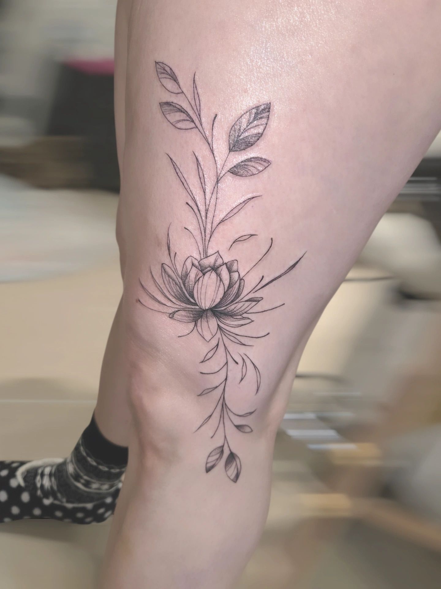 Fineline Tattoo — florales Motiv